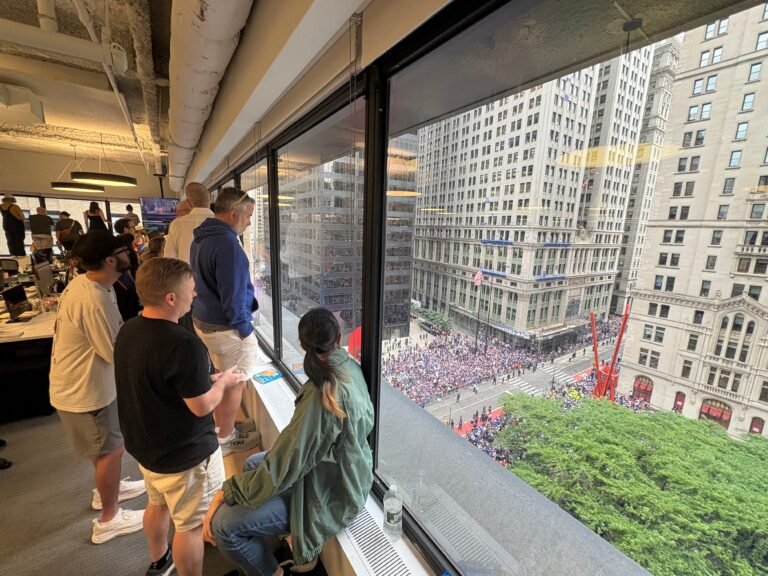 The hottest office perk in NYC today: a front-row view of the Knicks parade