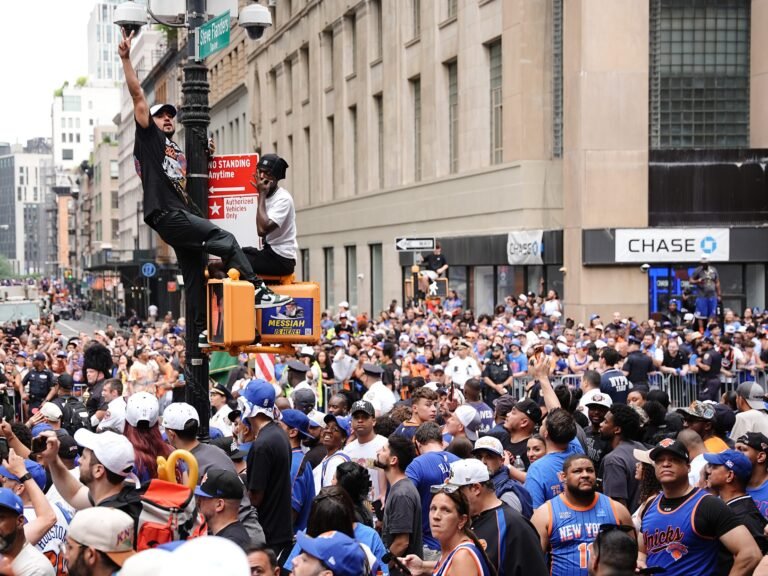 The Financial District turned orange and blue to celebrate the Knicks' first NBA championship in 53 years