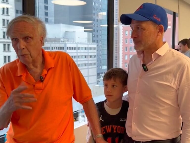 Three generations of Knicks fans celebrate by watching the championship parade