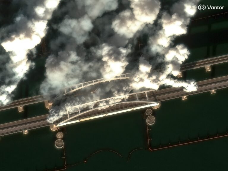 Satellite images show Russian forces throwing up smoke screens on a key Crimean bridge as Ukrainian drones target supply lines