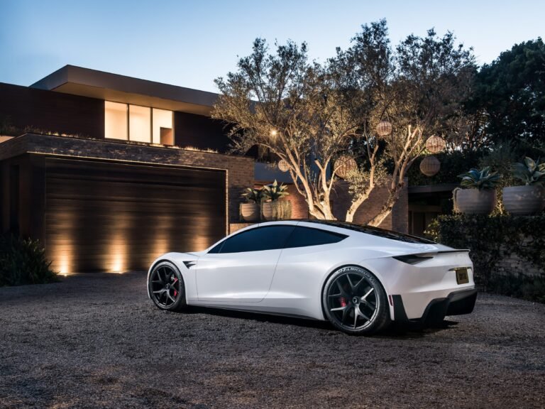 Tesla's design chief says Roadster's reveal is coming 'very soon'